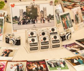 Photo booth prints and keepsakes displayed at an event at Meadow Tree Marquee